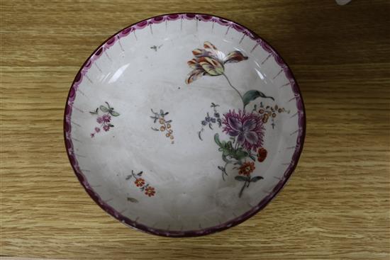 A 19th century Meissen jug and cover, cracked, 12.5cm., a Berlin gilt porcelain basket, another similar basket